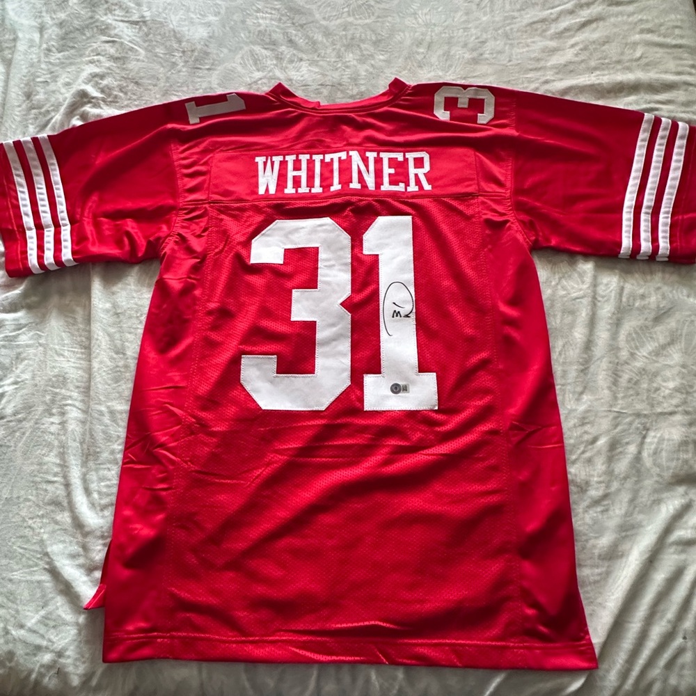 Donte Whitner autographed jersey. Beckett certified